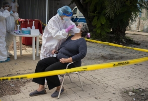 Woman in Uruguay gets COVID test. (AP)