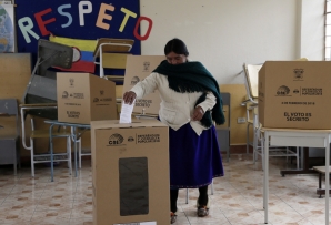 A woman votes in Ecuador. (AP)