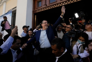 Bernardo Arévalo, center, after voting in the runoff in Guatemala City. (AP)