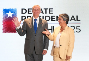 Candidates José Antonio Kast (L) and Jeannette Jara at a debate. (AP)
