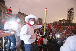 Peruvian presidential candidate Pedro Castillo holds his iconic pencil prop at a rally. (AP)