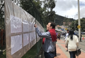 A Colombian voter checks the rolls in the Usaquén neighborhood of Bogotá on June 17.