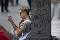 A man checks his smartphone in São Paulo. (AP)