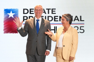 Candidates José Antonio Kast (L) and Jeannette Jara at a debate. (AP)