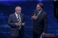 Lula da Silva (L) and Jair Bolsonaro face off at a debate. (AP)