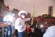 Peruvian presidential candidate Pedro Castillo holds his iconic pencil prop at a rally. (AP)